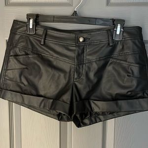 Black very short shorts.